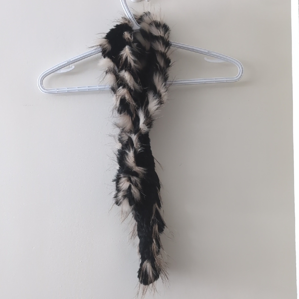 Dino Gaspari rabbit with racoons fur scarf